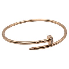 Bracelet manchette Cartier « Juste Un Clou » en or rose 18 carats, serti de diamants
