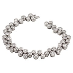 Bracciale “Bubble Tennis” con diamanti di diverse dimensioni per un totale di 6 carati, in oro bianco 14K