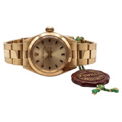 Montre-bracelet Rolex Oyster Perpetual pour femme en or jaune 18 carats