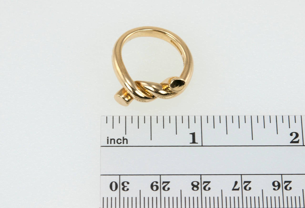 A very chic Angela Cummings twist ring in 18 karat yellow gold. Circa 1991.

Currently a US size 5.75 and easily adjustable.
