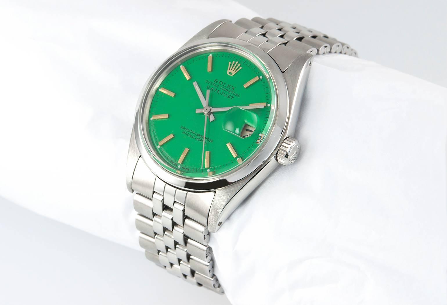 Rolex DateJust steel wristwatch, reference 1600. This classic Rolex watch features a custom green dial, a plastic crystal, stainless steel waterproof crown, smooth stainless steel bezel, with an old style jubilee bracelet. Circa 1967. The case width