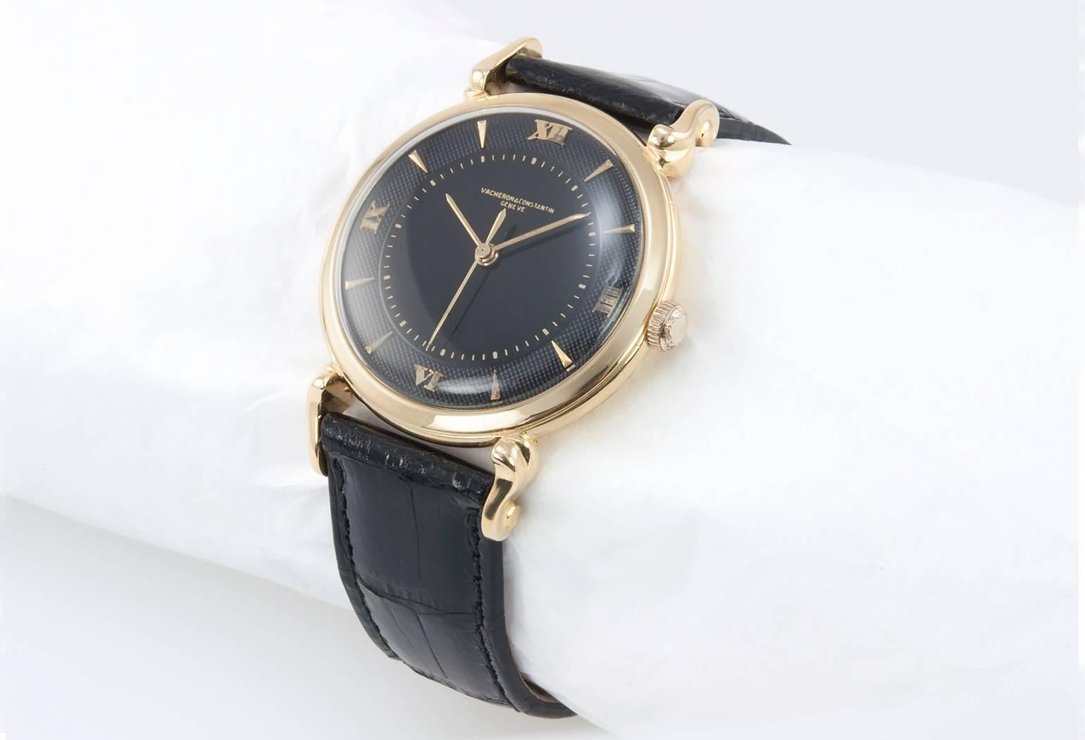 Vacheron and Constantin 18 karat yellow gold unisex wristwatch. This beautiful watch features a refinished black dial, unusual curly lugs, 17 jewel center post manual wind movement, plastic crystal, and a new black alligator leather strap. The case