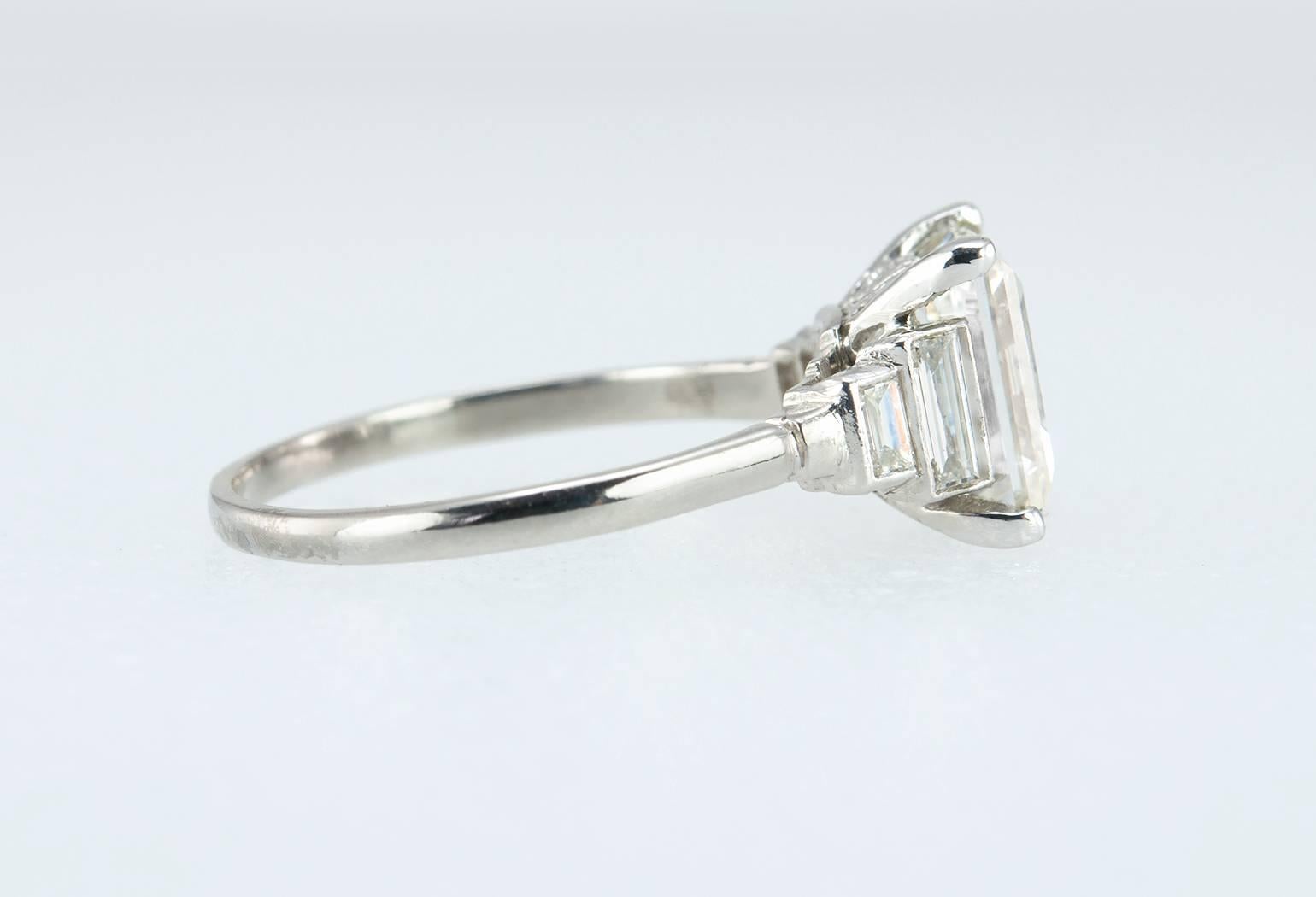 art deco emerald cut engagement rings