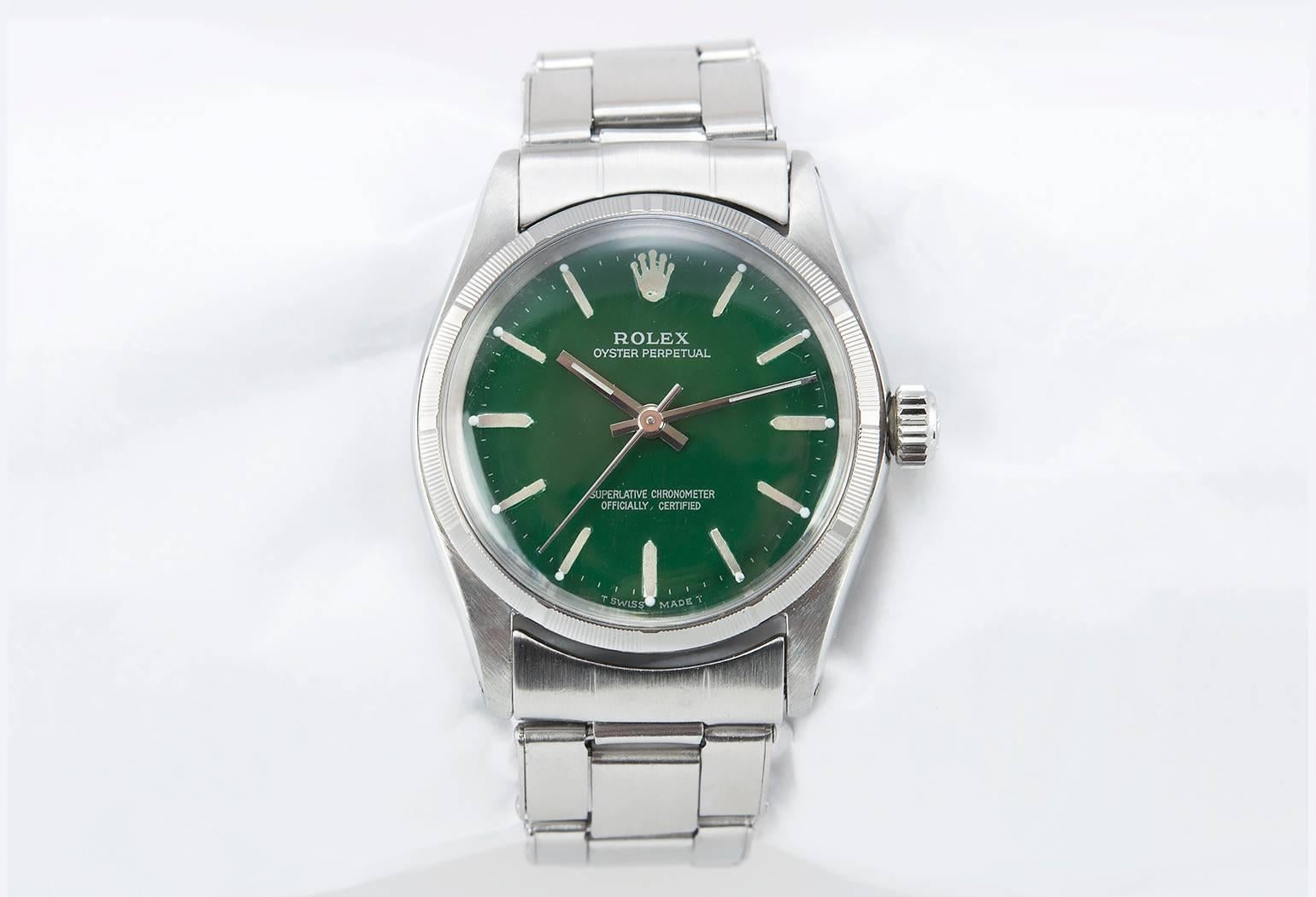 rolex with green face