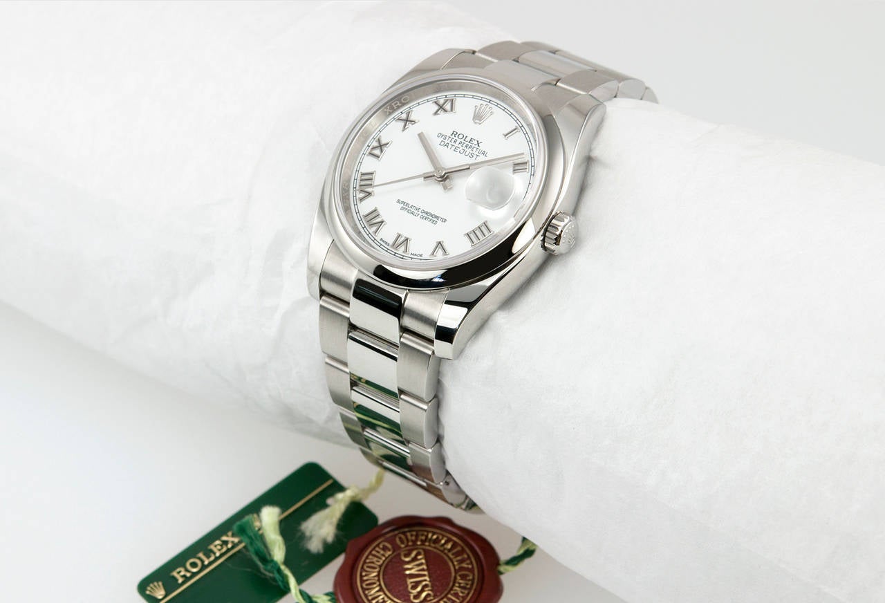 Rolex DateJust wristwatch in stainless steel, reference 116200. This classic Rolex DateJust is from 2015 and comes with original box and papers. The watch features a smooth steel bezel, sapphire crystal, locking waterproof crown, white roman numeral