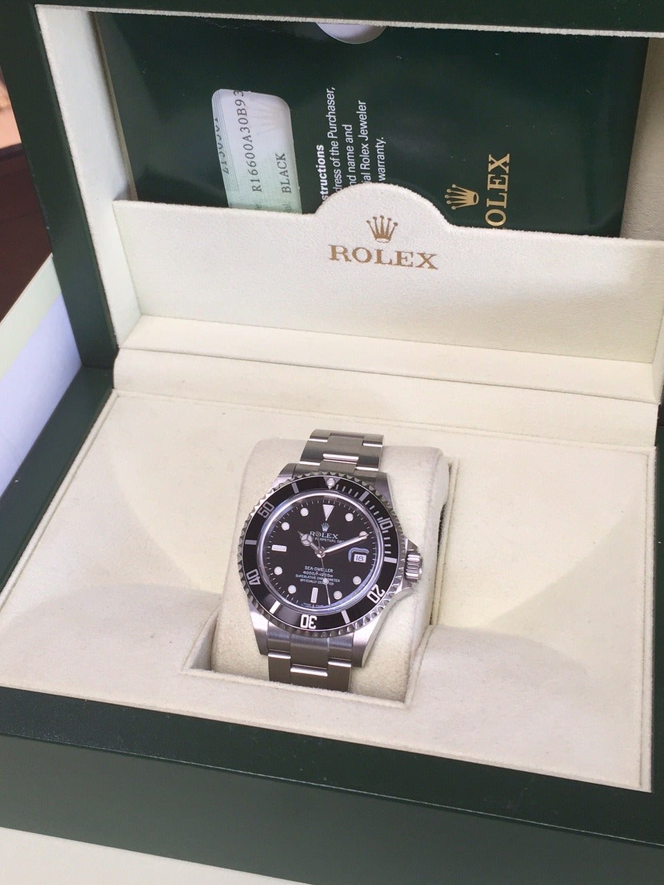 Rolex stainless steel Sea-Dweller wristwatch, Ref. 16600,  2006. This watch features a helium escape valve, a black dial with luminescent hour markers, automatic movement with date, scratch-resistant sapphire crystal, waterproof screw-down crown.