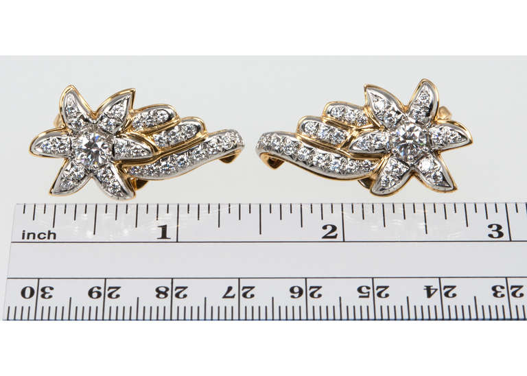 Make a wish on these gorgeous Tiffany & Co. Schlumberger shooting star earrings! 3.60 carats of total diamonds set in 18 karat yellow gold and platinum, circa 1960. These are show-stopping earrings!
Signed Tiffany & Co., Schlumberger, 750,