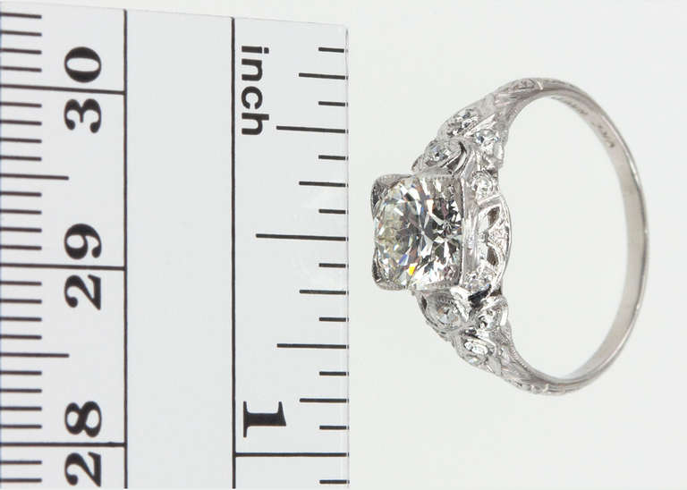 Elegantly Edwardian! A lovely 1.05ct H-VS2 diamond ring set in platinum featuring delicate open pierced work and 12 single cut diamonds that add an overall sparkle to this ethereal ring. Circa 1915-1920.

EGL certificate
Currently a size 6.5 and