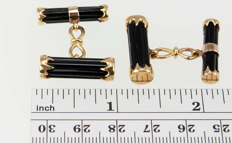 These handsome Tiffany & Co. cufflinks feature carved fluted onyx set in 18 karat yellow gold from c.1980s. A great addition to any shirt!
Signed Tiffany & Co. 18K
Width is approximately 0.87 inches.