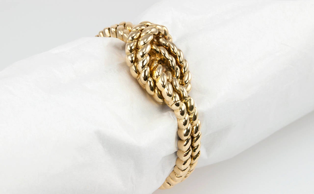 Women's Van Cleef & Arpels Hidden Watch Gold Knot Bracelet, Circa 1960s For Sale