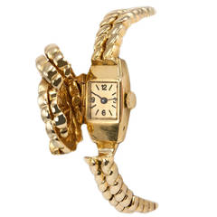 Van Cleef & Arpels Hidden Watch Gold Knot Bracelet, Circa 1960s
