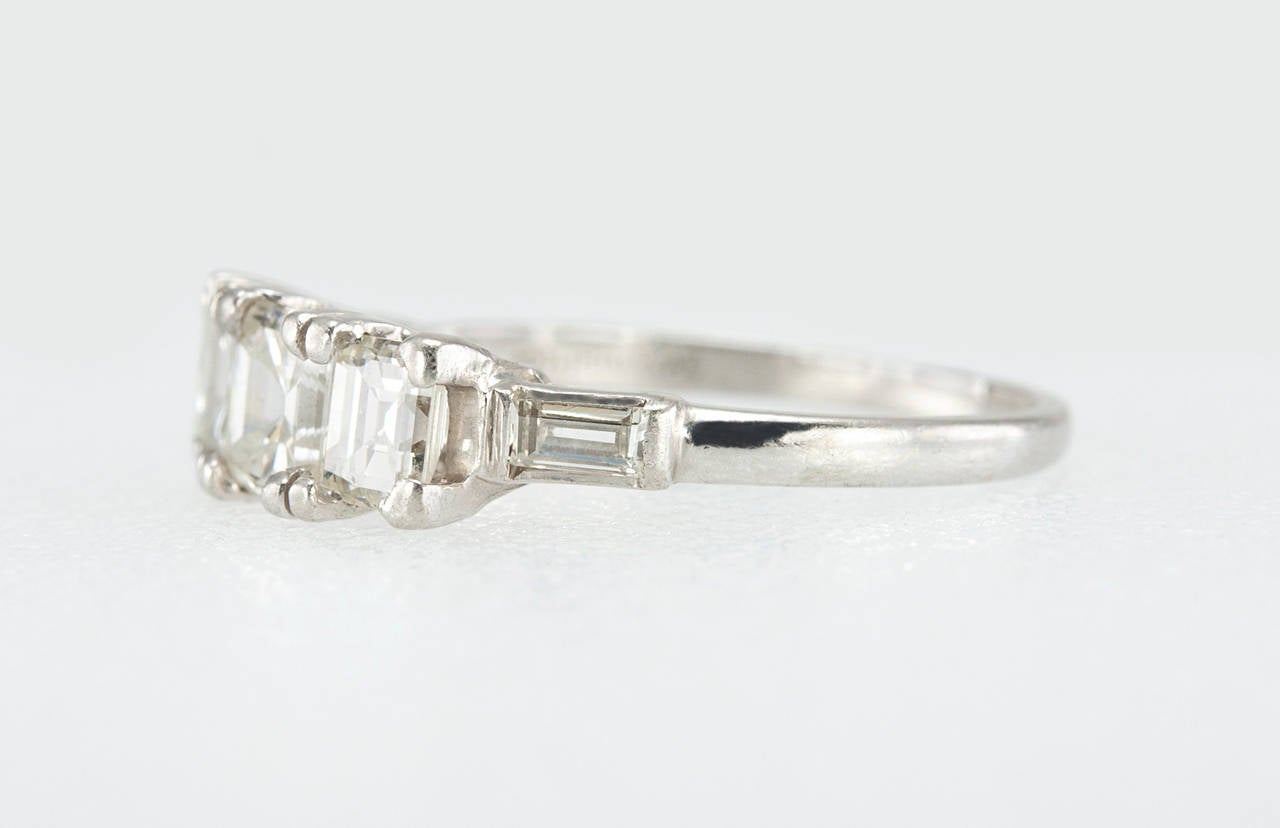 Art Deco Square Emerald Cut Diamond Platinum Three Stone Ring In Excellent Condition For Sale In Los Angeles, CA