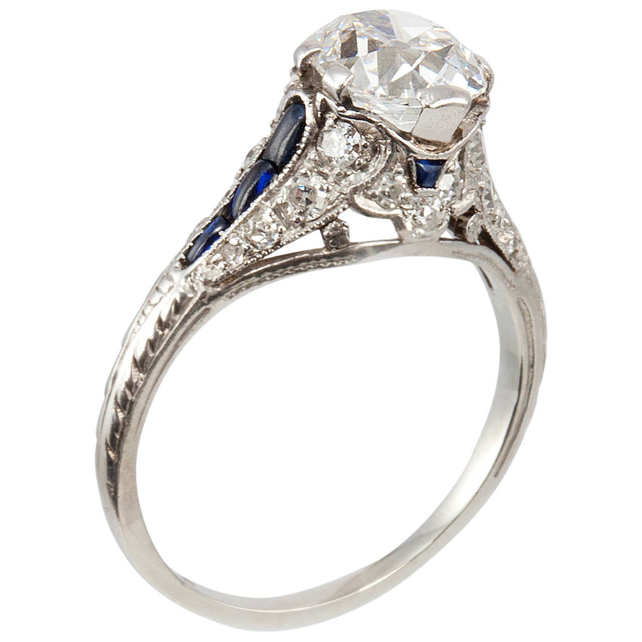 1.57 Carat Cushion Cut Diamond Sapphire Platinum Antique Engagement Ring For Sale