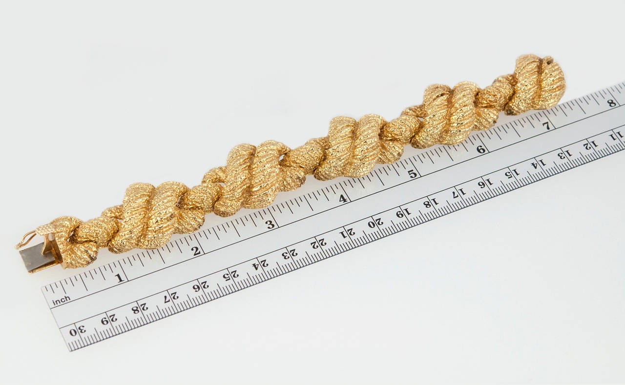 This sculptural gold bracelet has an awesome texture that makes this 18 karat gold piece interesting but simple enough to wear every day! Circa 1970s.
Bracelet is approximately 7.5 inches long and diameter is 6.75 inches.