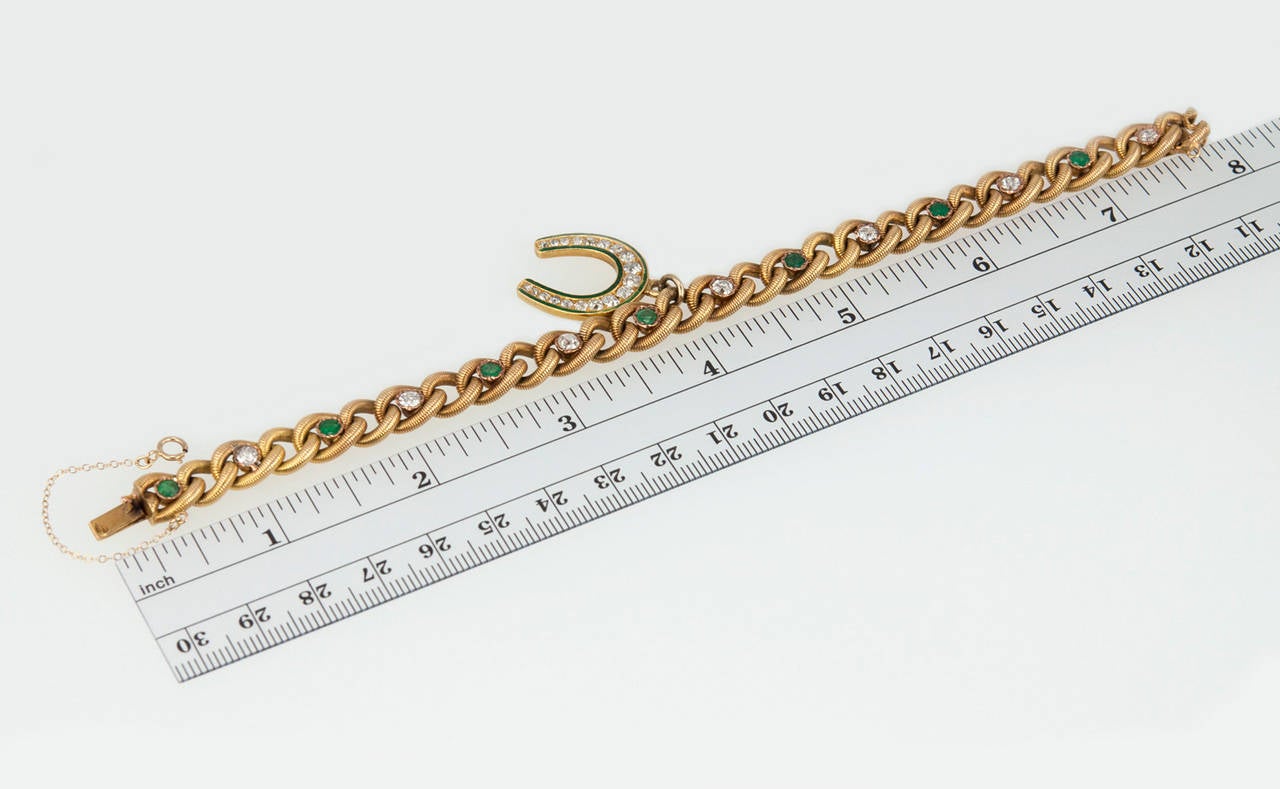 This special Victorian bracelet consists of 18 karat yellow gold interlocking chain set with alternating seven emeralds and seven diamonds, circa 1900s. The total diamond weight is approximately 2.50 carats. The bracelet measures 7 inches in