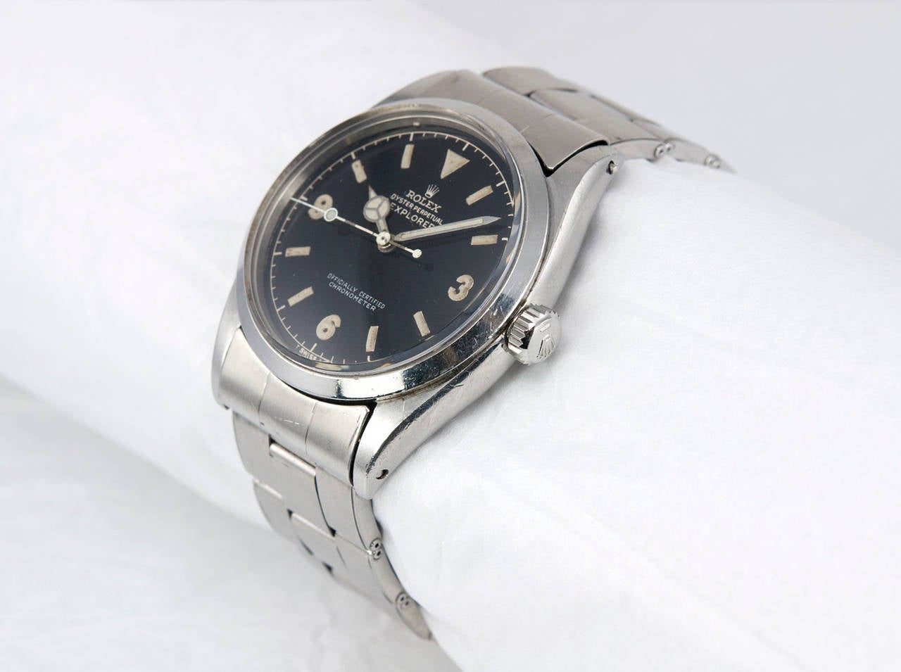 Rolex stainless steel Explorer wristwatch, Ref. 6610, 1959. This watch has the original gilded service dial, plastic crystal, water-resistants crown, steel riveted oyster bracelet. The case measures approximately 36 mm in diameter.  1959.

This
