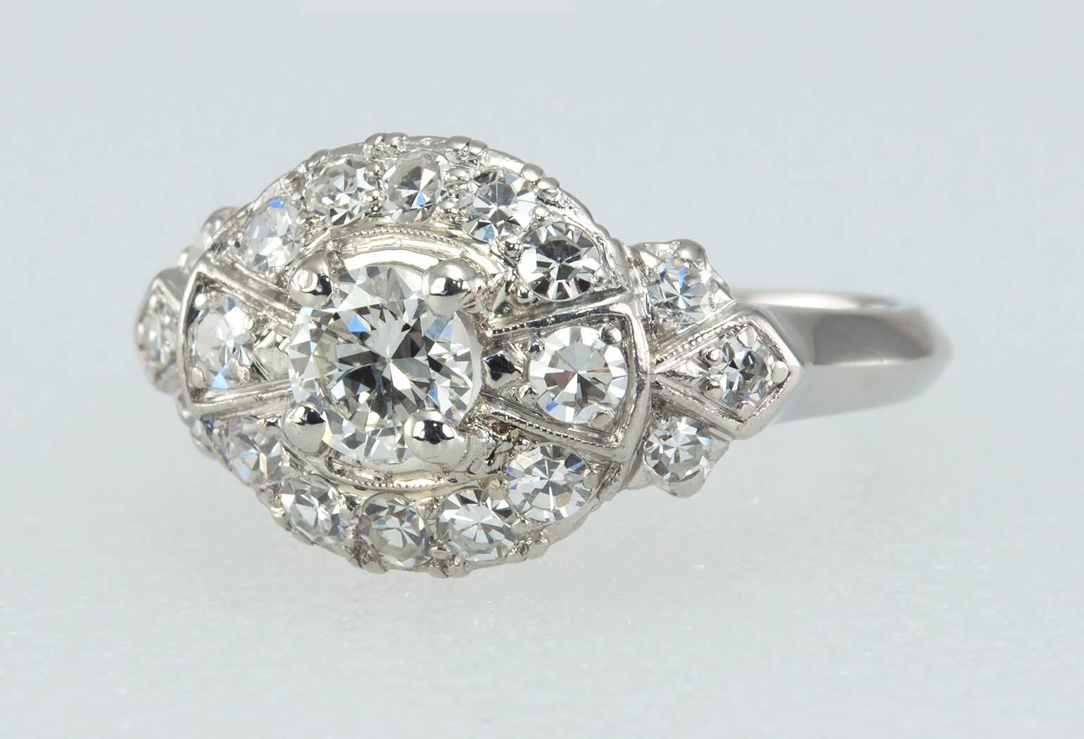 1940s Diamond Platinum Bow-Shaped Ring In Excellent Condition For Sale In Los Angeles, CA