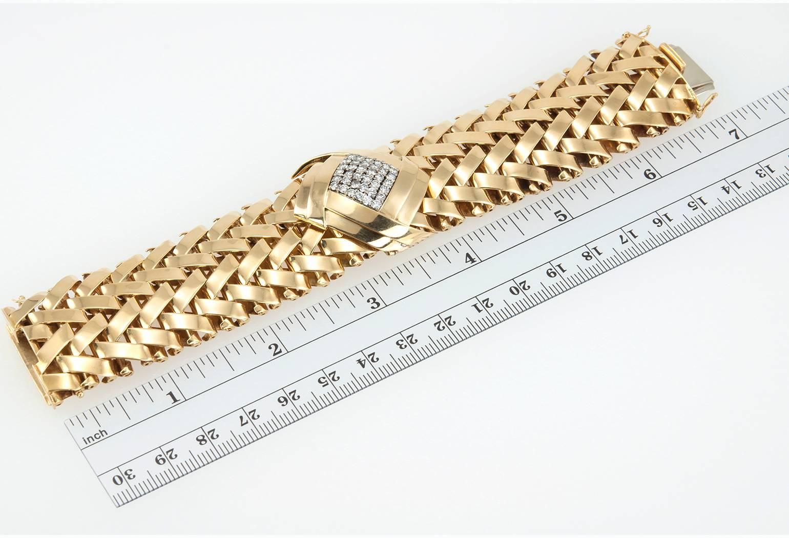Vacheron & Constantin ladies 18 karat yellow gold woven style bracelet with hidden watch. This magnificent piece features 36 round brilliant cut diamonds, totaling approximately 1.50 carats of diamonds that are G/H in color and  VS2 in clarity. The