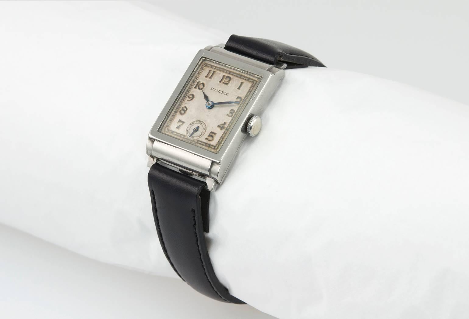 Rolex dress watch in stainless steel, reference 2536. This early Rolex watch features an original dial, stainless steel case, manual wind 15 jewel movement, glass crystal, stainless steel crown. Circa 1928! On a new black leather strap. The case