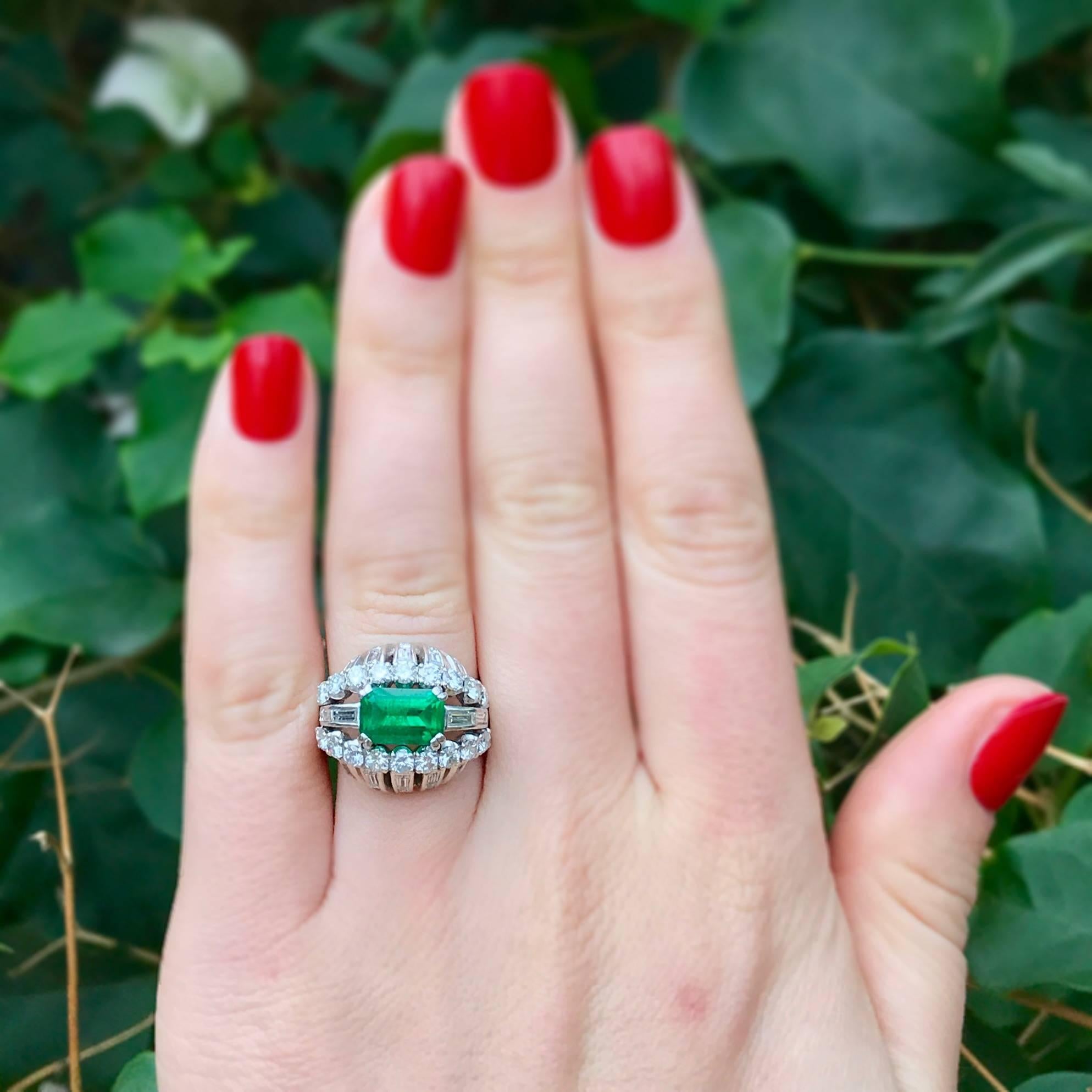 Vintage 1950s Emerald and Diamond Bombe Platinum Cocktail Ring For Sale 4