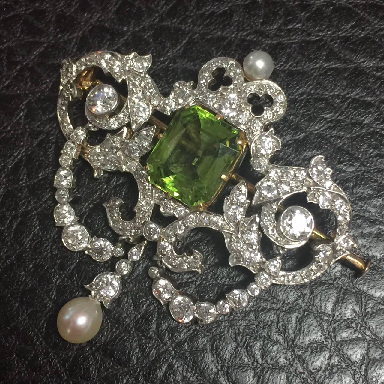 Finest quality Tiffany & Co. Victorian Peridot and Diamond brooch.  One of the rarest items of jewelry.  The brooch has approximately 3.50 carats of Old European Cut diamonds and an approximately 5 carat emerald cut gorgeous peridot.  The brooch is