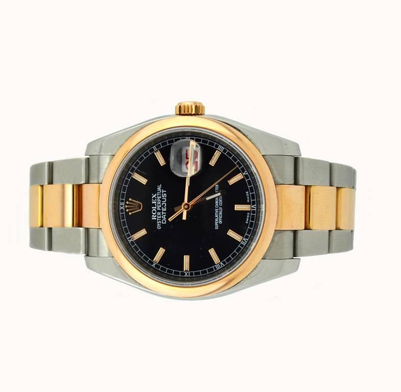 Rolex DateJust wristwatch, reference 116201. A modern Rolex in 18 karat Everose gold and stainless steel, which features an 18 karat Everose gold smooth bezel, a locking waterproof Everose gold crown, a black stick dial, and a 18 karat Everose gold