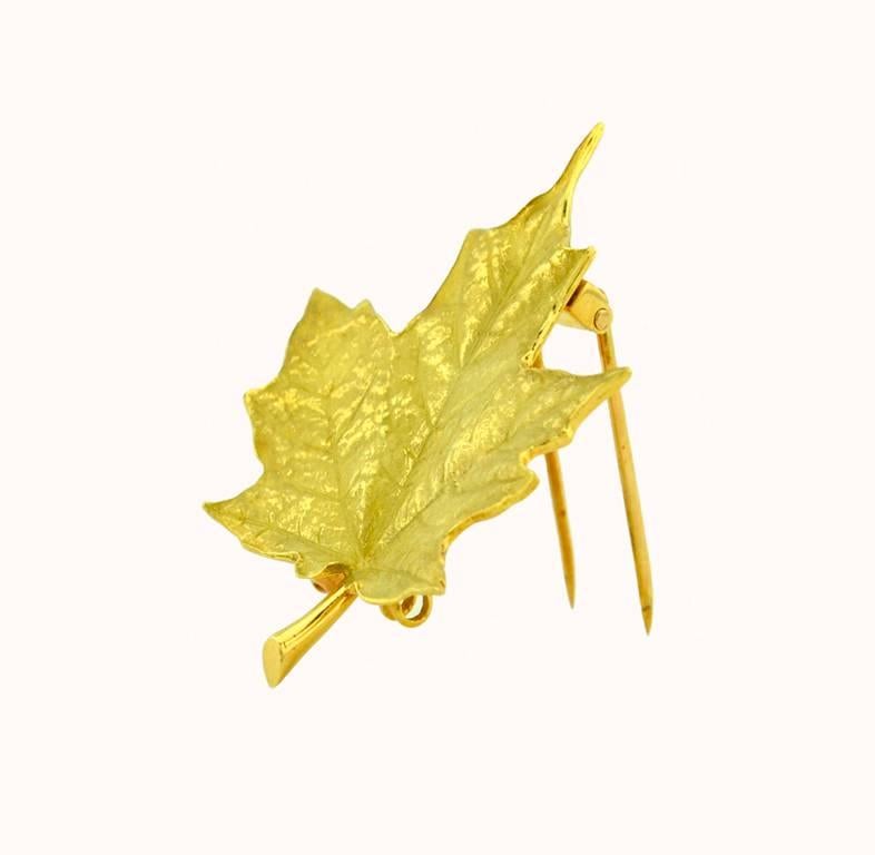 Tiffany & Co. maple leaf brooch in 18 karat yellow gold from circa 1960.  This brooch has fantastic realistic detail and a very wearable piece.  

This brooch measures approximately 1.48 inches in width and 1.85 inches in height.
