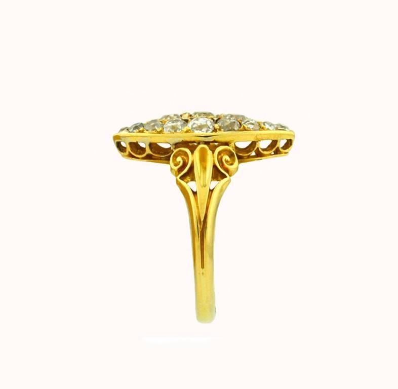 Victorian navette shaped ring in 18 karat yellow gold from circa 1900.   This beautiful ring features 19 Old European Cut diamonds for a total of 1.70 carats in diamond weight (approximate).  

This ring is currently a US size 6.5 and measures