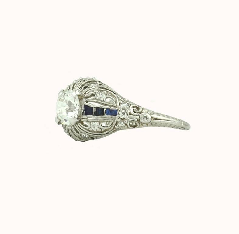 Art Deco 0.66 Carat Old Cut Diamond and Sapphire Platinum Engagement Ring In Excellent Condition For Sale In Los Angeles, CA