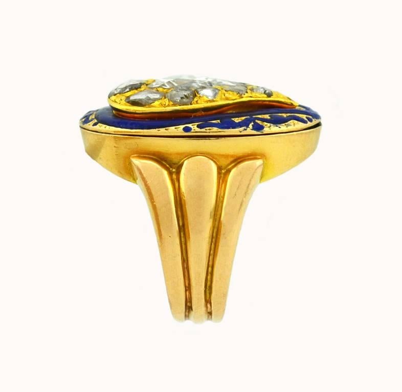 This is a gorgeous Victorian 18k yellow gold witches heart ring with one large pear shaped rose cut, approximately 0.30cts and 12 rose cuts around 0.20cts. With blue enamel details, circa 1850.  Size 6 and easily altered.