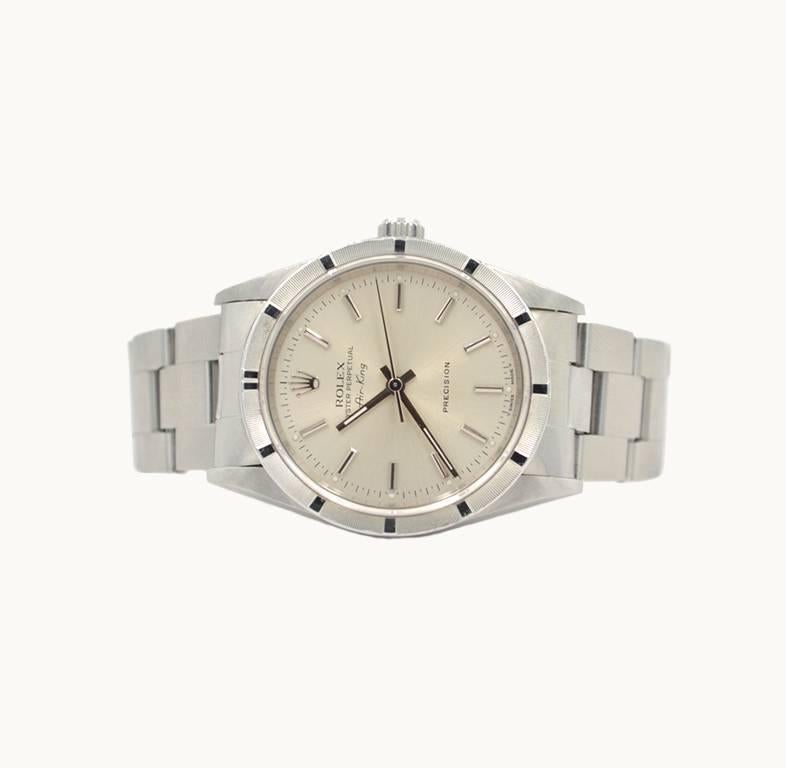 Rolex stainless steel Airking wristwatch, reference 14010 from 1996. This classic Rolex watch features a stainless steel oyster case, with a stainless steel oyster link bracelet, sapphire crystal, engine turned stainless steel bezel, silvered