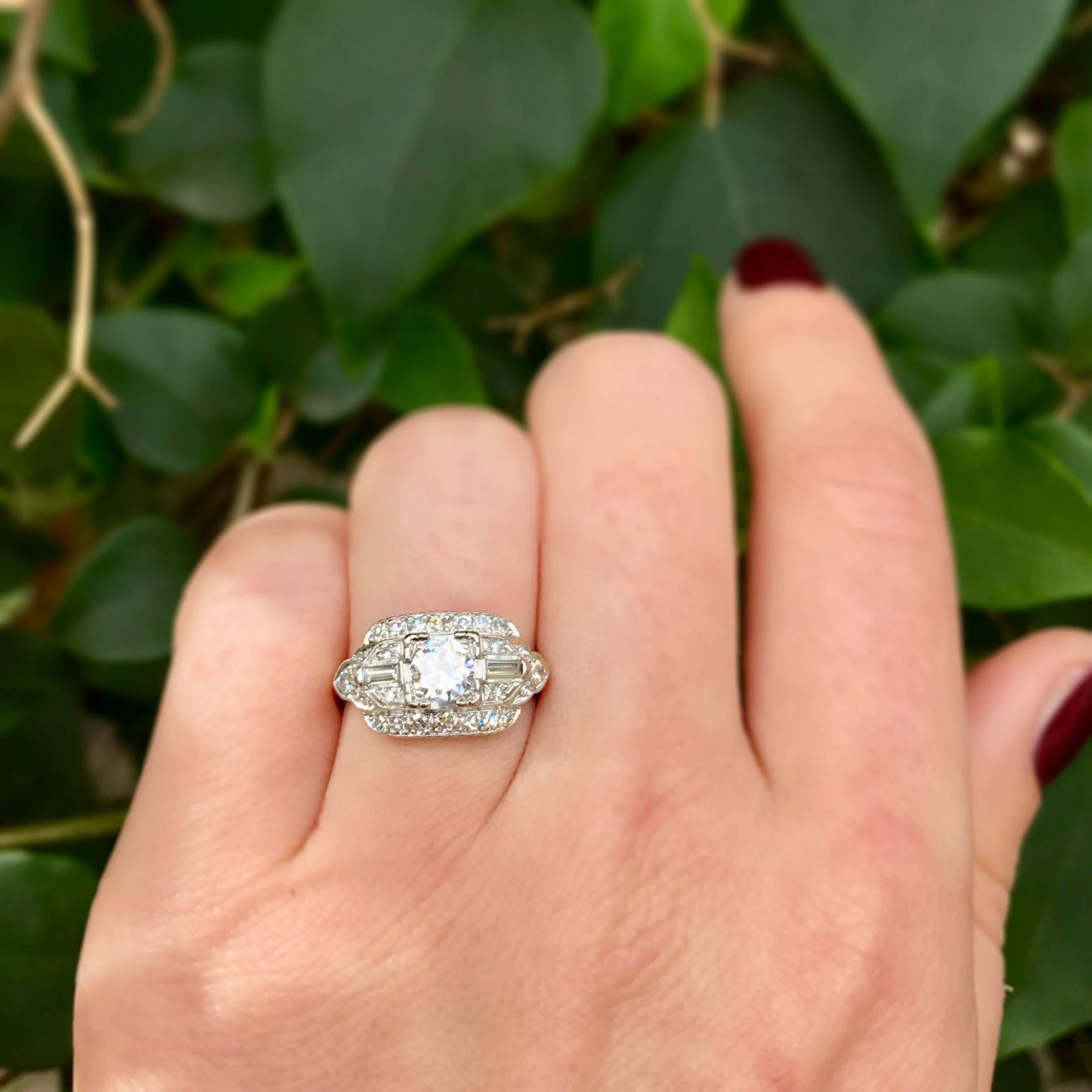Women's Vintage 1950s 0.46 Carat Diamond Center and Platinum Engagement Ring For Sale