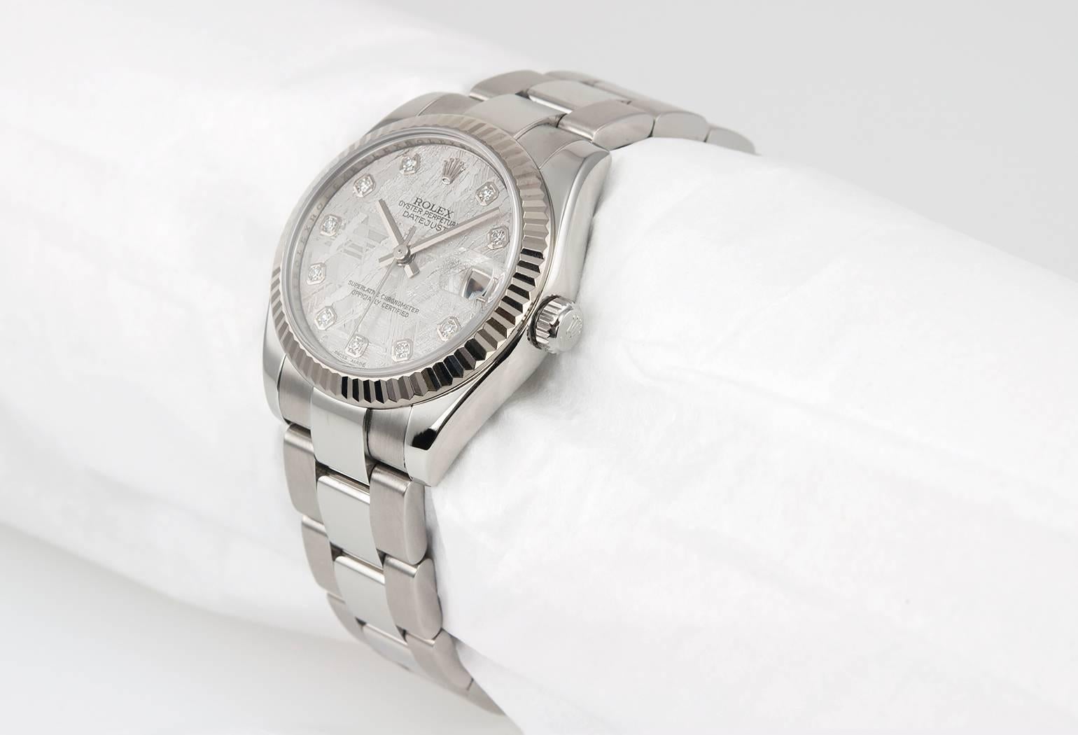 Rolex DateJust wristwatch, reference 1782744.  This stainless steel Rolex features a meteorite  diamond dial with the new style stainless steel oyster bracelet, fluted 18 karat white gold bezel, sapphire crystal, stainless steel locking crown. The