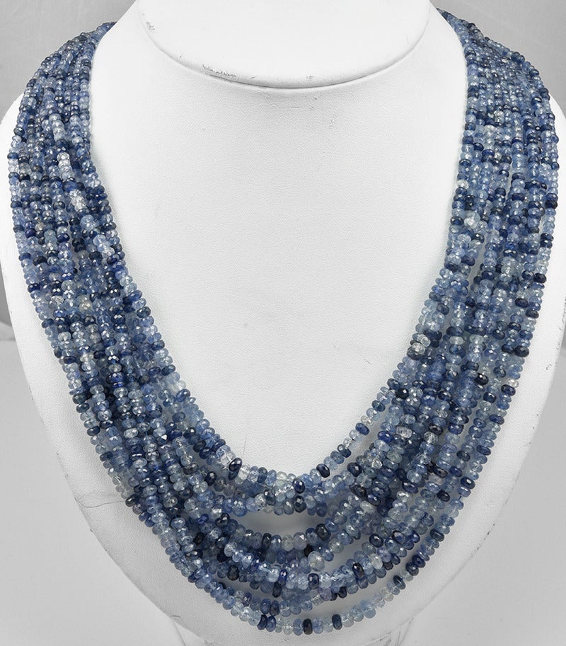 Gorgeous Virginia Witbeck, original, natural sapphire and 22K necklace. Can be worn very long or double. Thousands of carats of multi shades of blue sapphires are used to create this lush multi strand necklace. This is a one of a kind, signed piece.