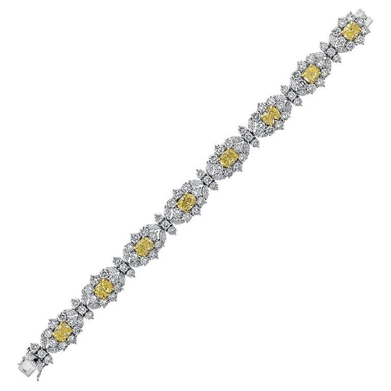 24.89 Ct. Fancy Yellow and White Diamond Bracelet in Platinum For Sale