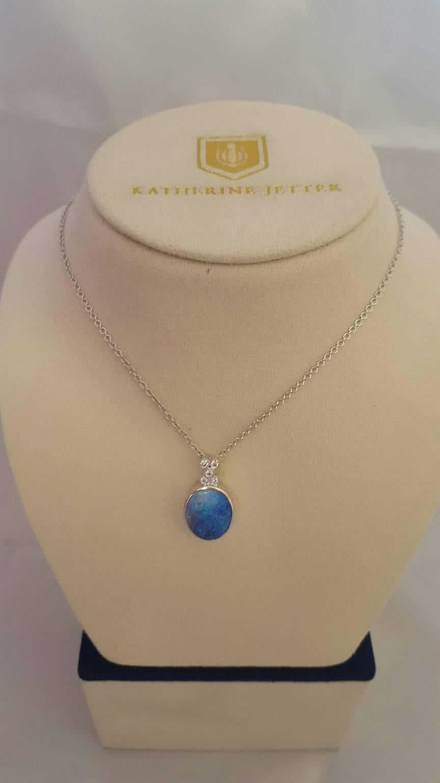 This ageless and timeless pendant is set in 18K White Gold with a 9.33ct Boulder Opal, 0.17ct White Diamond bezel set accents on bail with signature turtle clasp chain. The perfect transition piece from day to night - pairs beautifully with our