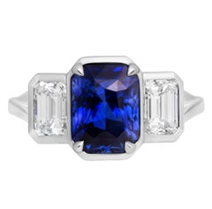 GIA Certified Three Stone Ring with 3.31ct Blue Sapphire