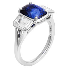 GIA Certified Three Stone Ring with 3.31ct Blue Sapphire