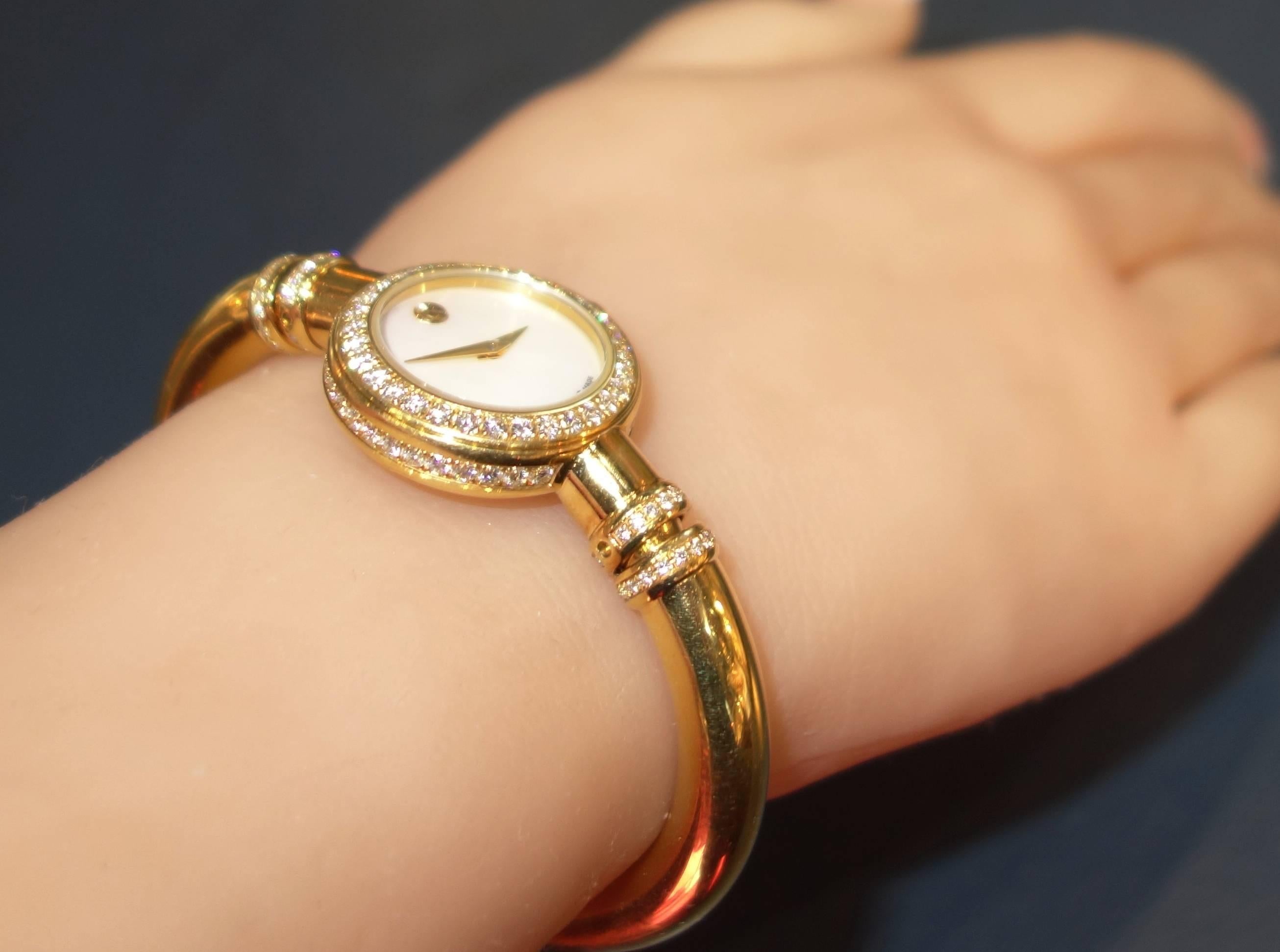 Movado Ladies Yellow Gold Diamond Bangle Bracelet Quartz Wristwatch In Excellent Condition In Aspen, CO