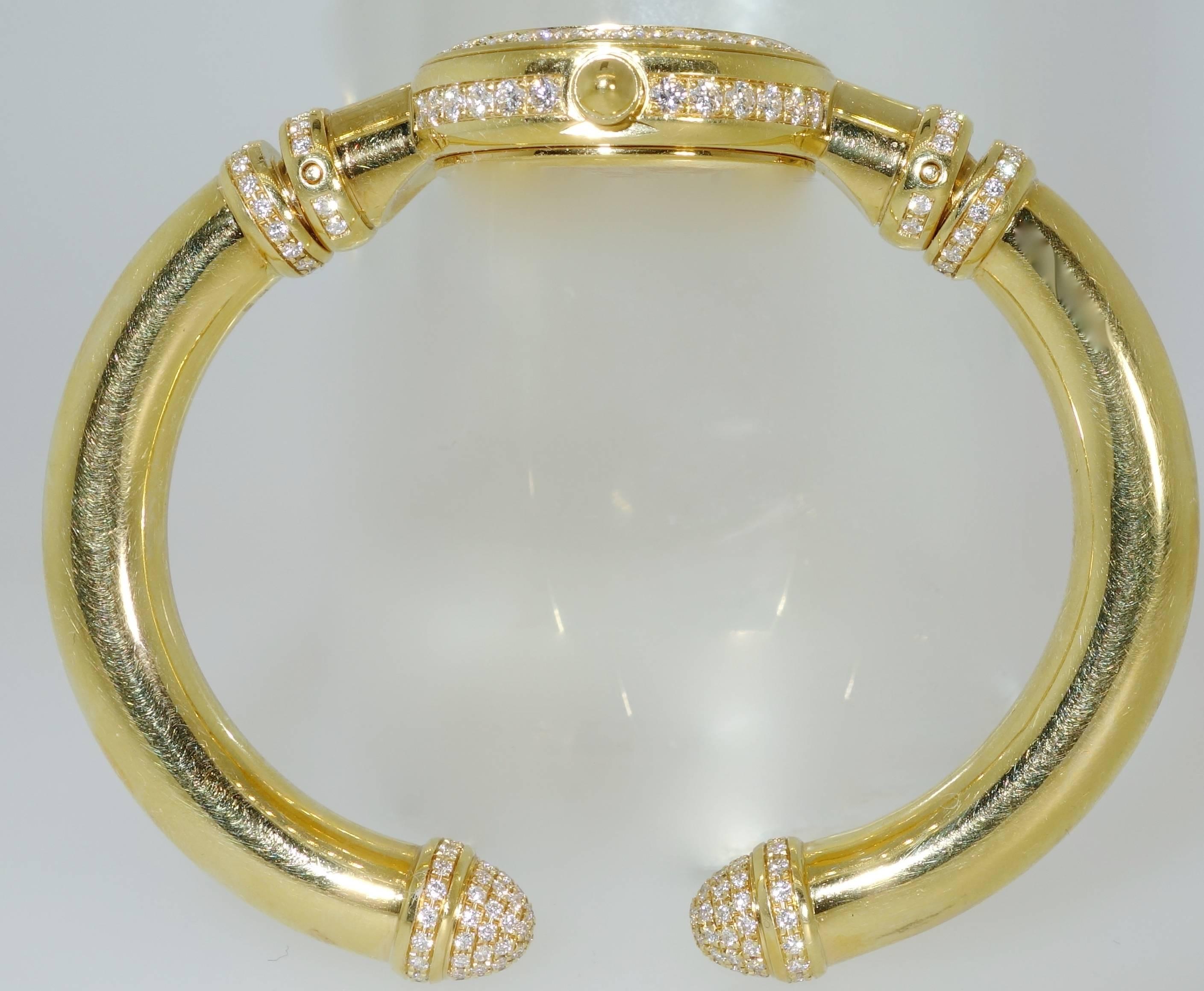 Contemporary Movado Ladies Yellow Gold Diamond Bangle Bracelet Quartz Wristwatch