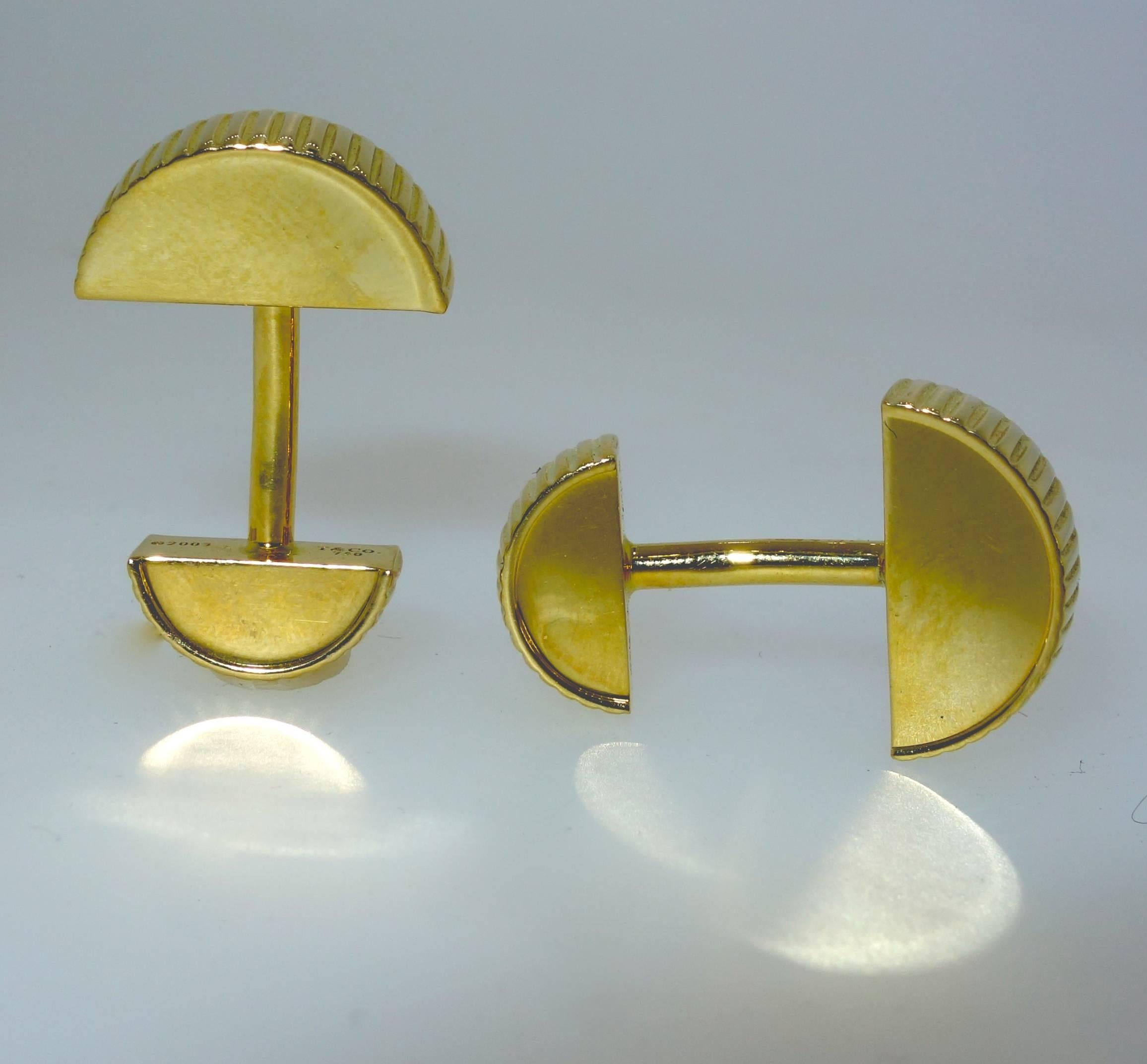 Tiffany & Co., signed and numbered, cufflinks of an usual design, circa 1960.  Easy to put on, striking with a classic motif.