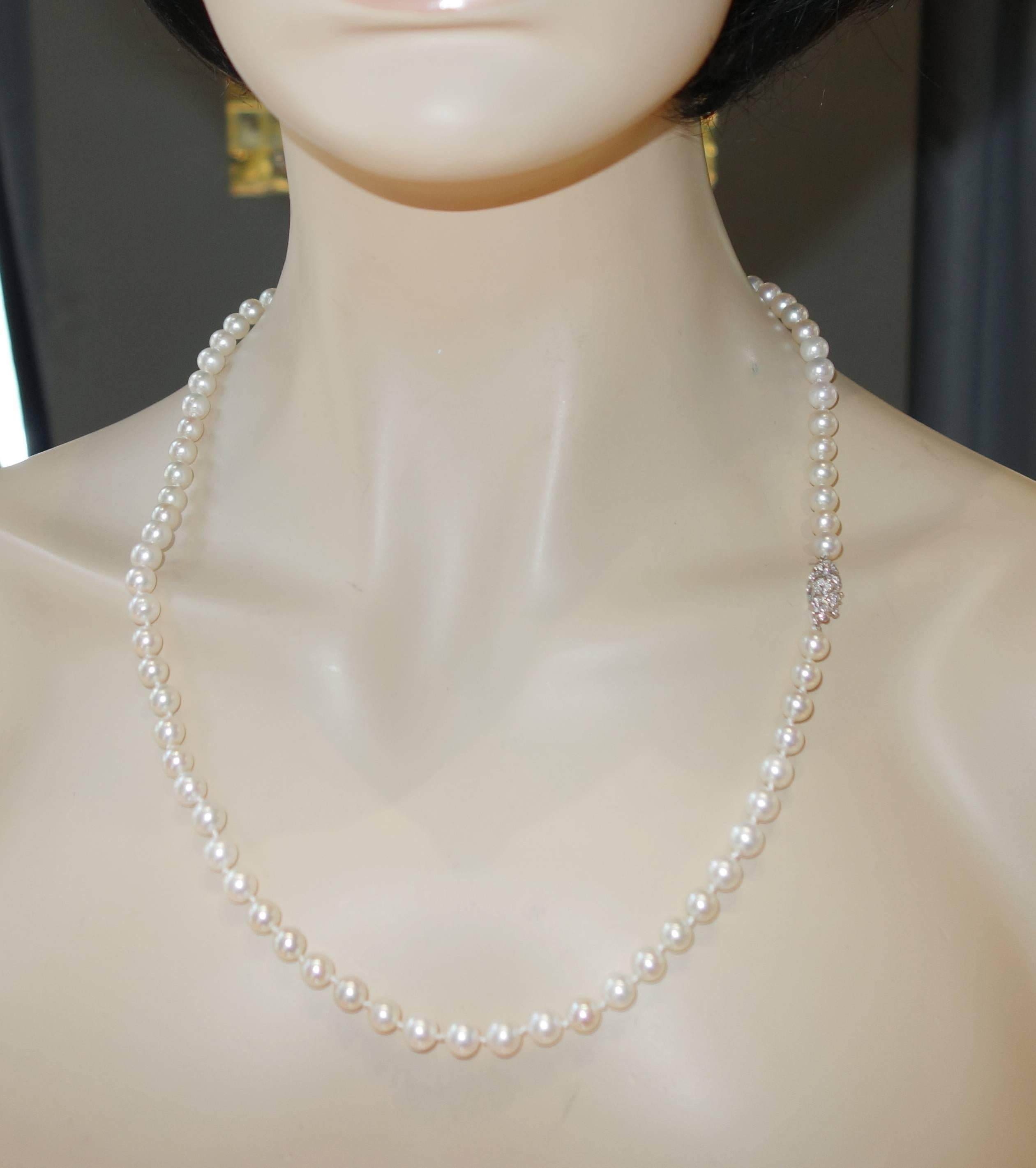 Women's Fine Strand of Pearls with a Diamond Clasp