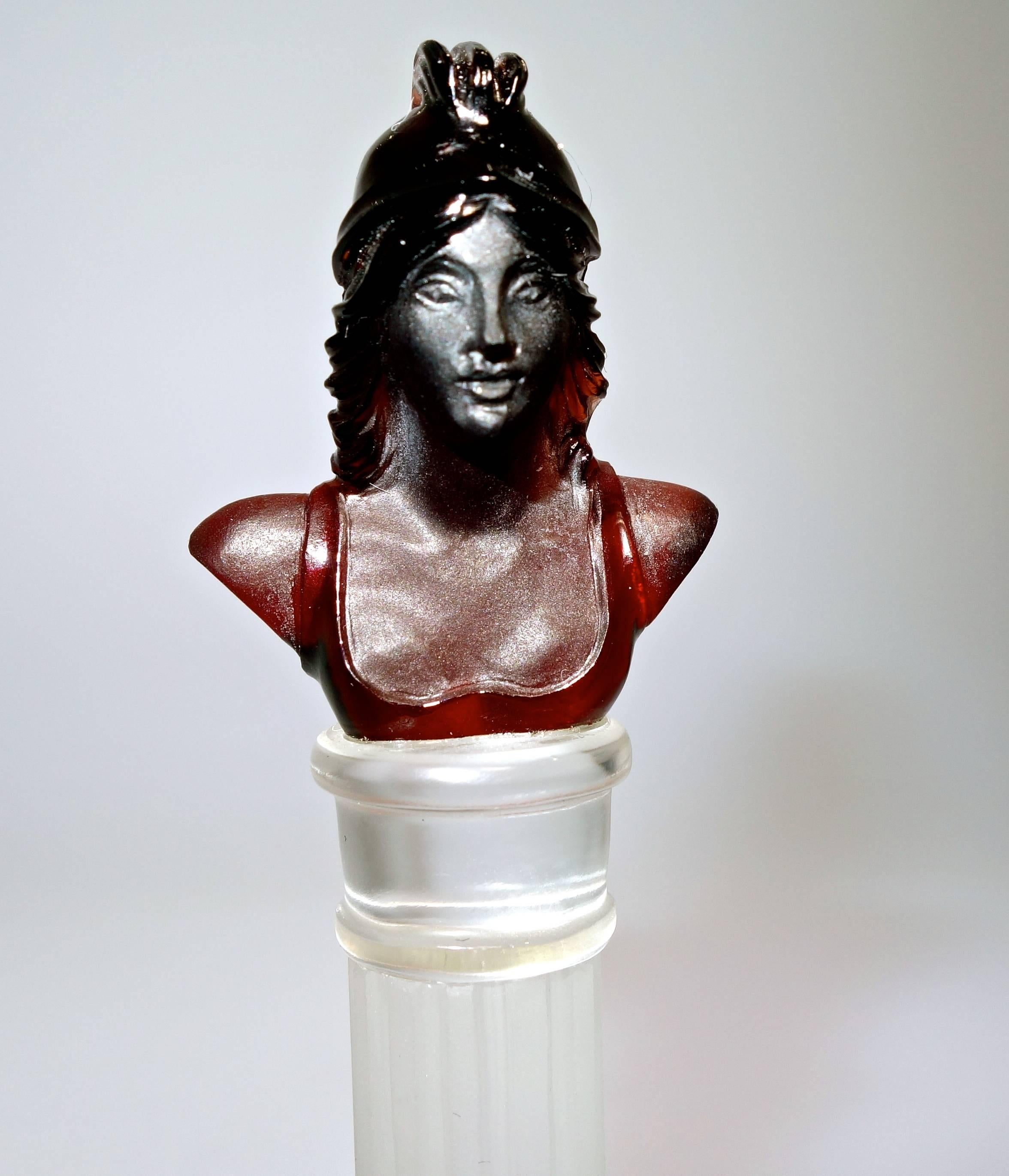 Unusual and finely carved in round natural garnet bust on a rock crystal base.  Accompanied by A.G.L.  certificates stating natural stones, this object is well done obviously by a master in the 19th century.  This piece, in fine condition, is 3 1/8