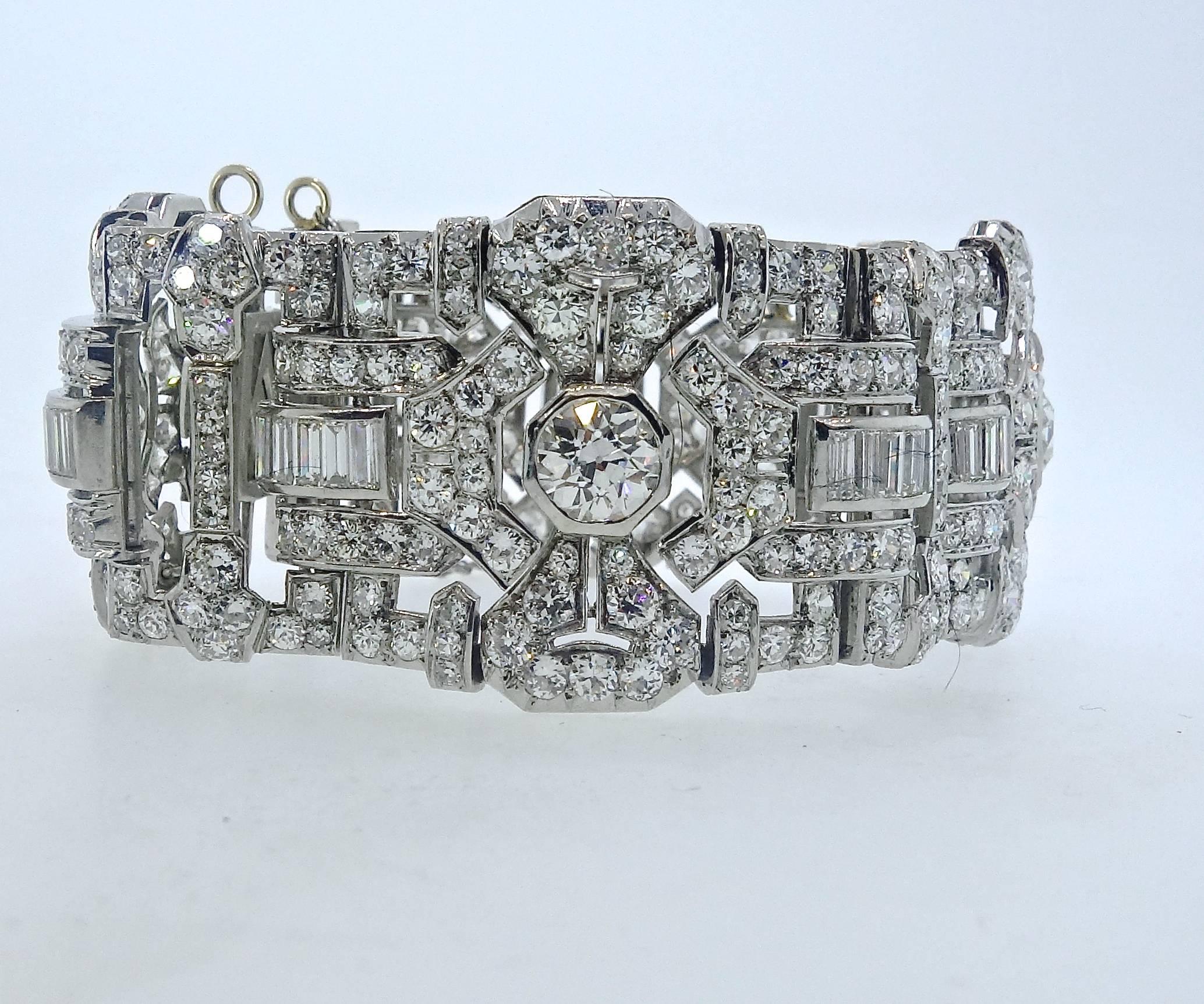 Classic French Art Deco statement with approximately 30 cts. (456 diamonds), of fine diamonds.  The four central major diamonds are a European cut, weighing approximately 1.20 cts., 1.30 cts., 1.40 cts., and 1.40 cts. (5.30 cts total.) These stones