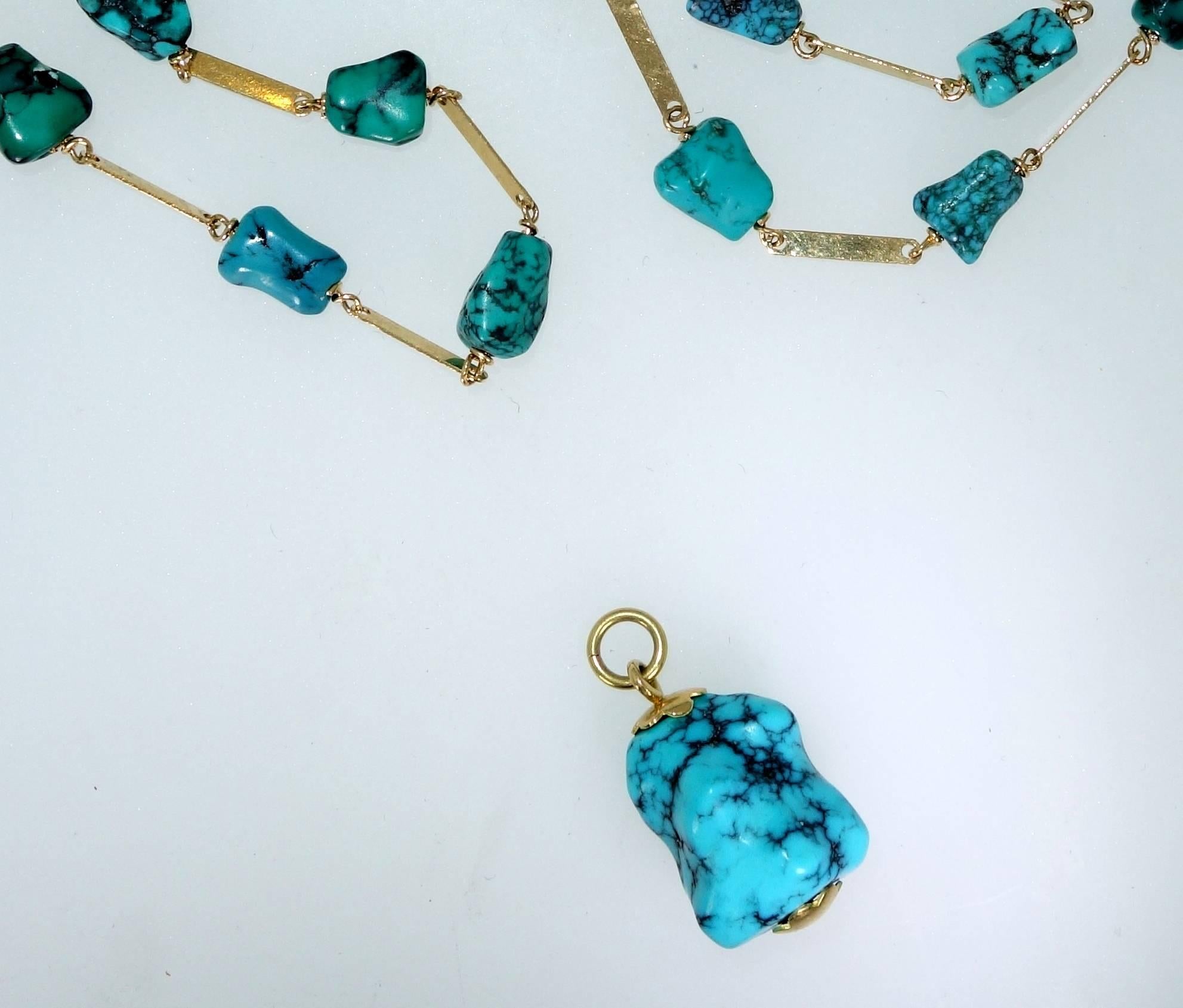 Natural Persian turquoise and 18K long necklace with large removeable turquoise nugget at the bottom.  This nugget with natural matrix matches the turquoise in the long chain, it is one inch by .5 inches.  The necklace is 28 inches long.  The piece