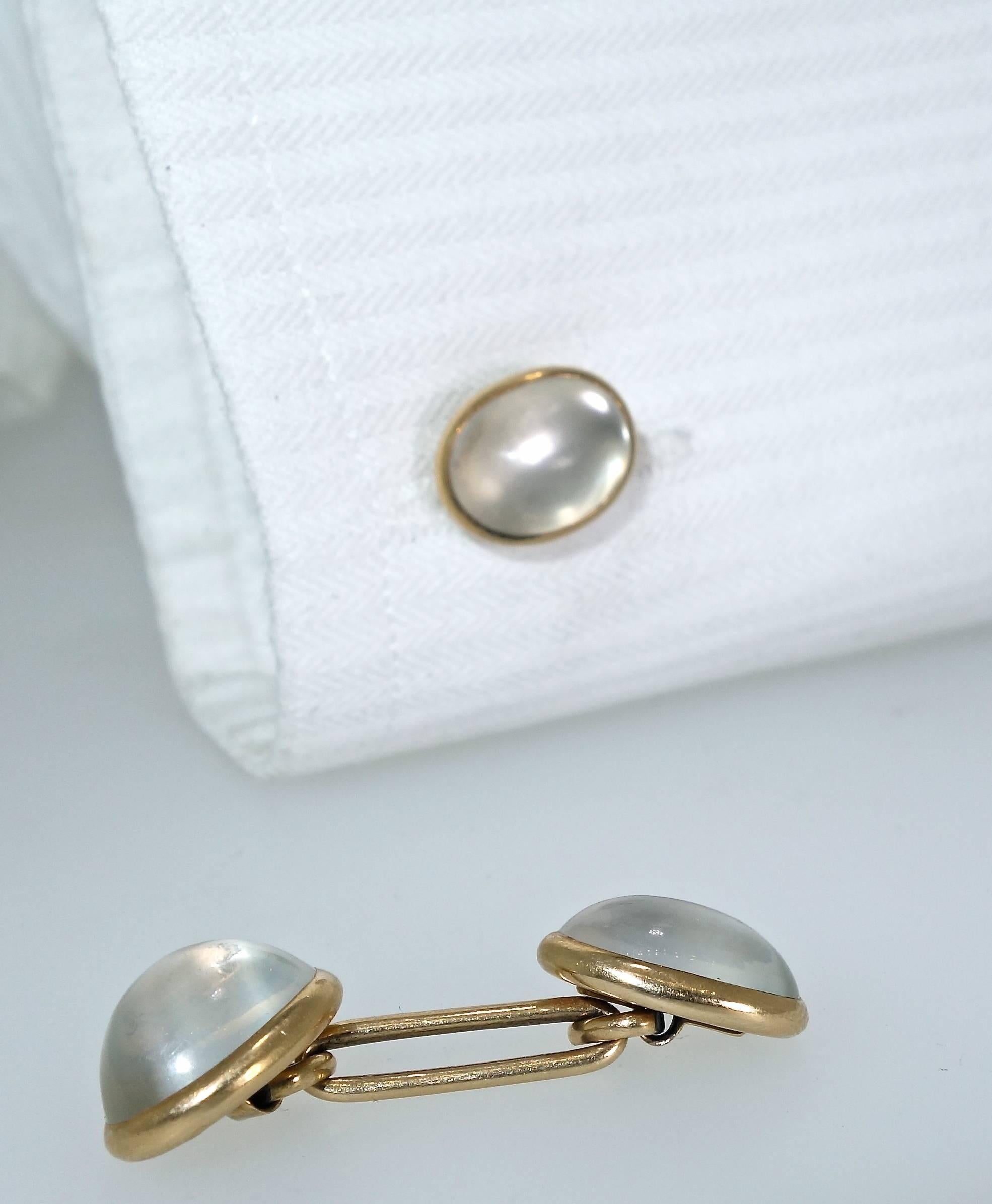 Antique cufflinks possessing four oval moonstones set in gold by the famous American firm Black, Star & Frost.  21.25 grams, circa 1903.