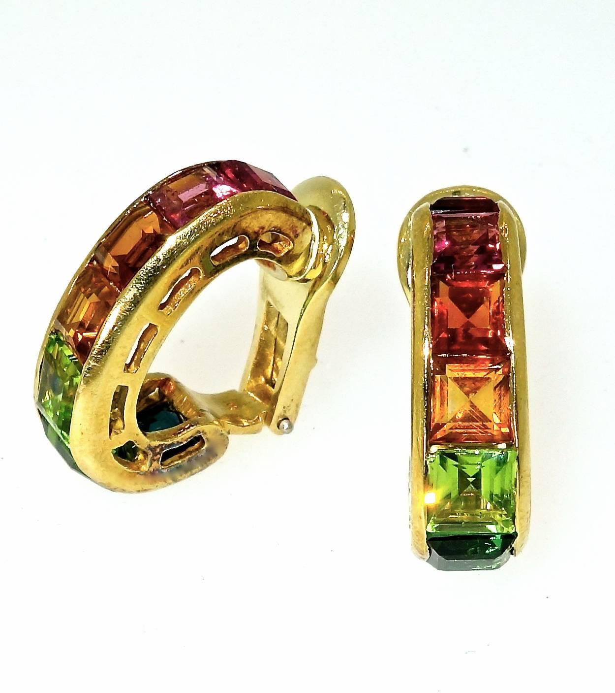 Tourmaline, citrine and peridot are channel set in 18K gold.  The square cut stones are all clean and bright creating vivid colors on the ear.  These earrings are .75 inches long and are now for a non-pierced ear.  We can easily convert them to a