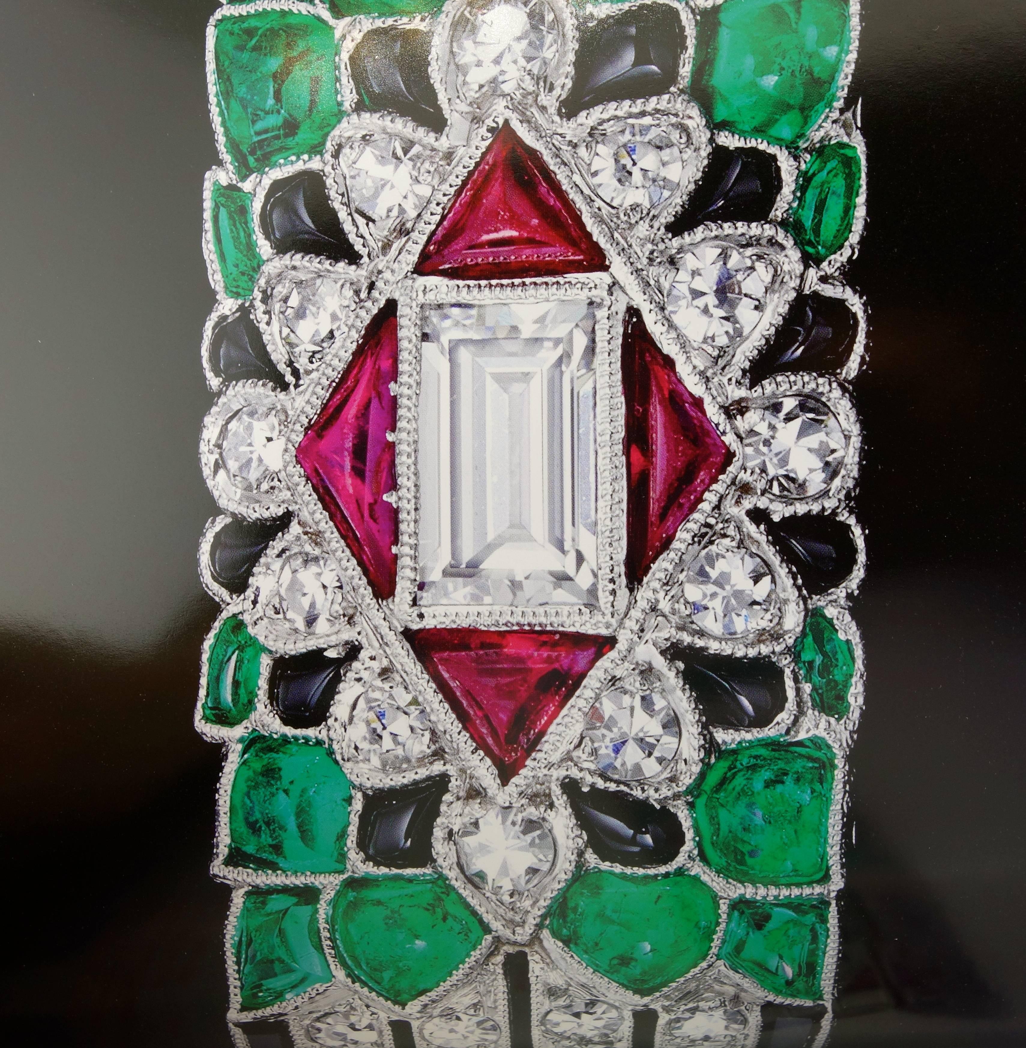 Art Deco Emerald, Diamond, Ruby and Onyx Brooch, circa 1925 1