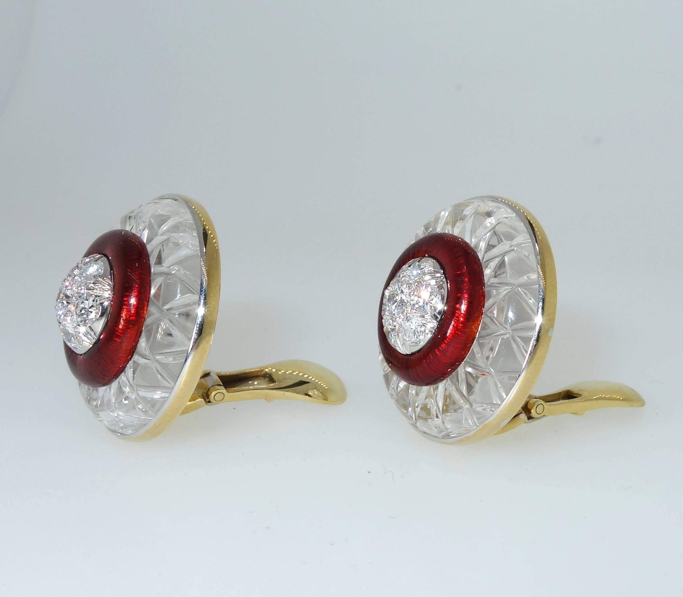 David Webb (during his lifetime - pre-1976) unusual earrings centering a total of 14 fine white brilliant cut diamonds weighing approximately 1.5 cts and surrounded by intense red guillochee enamel all within a frame of carved rock crystal weighing