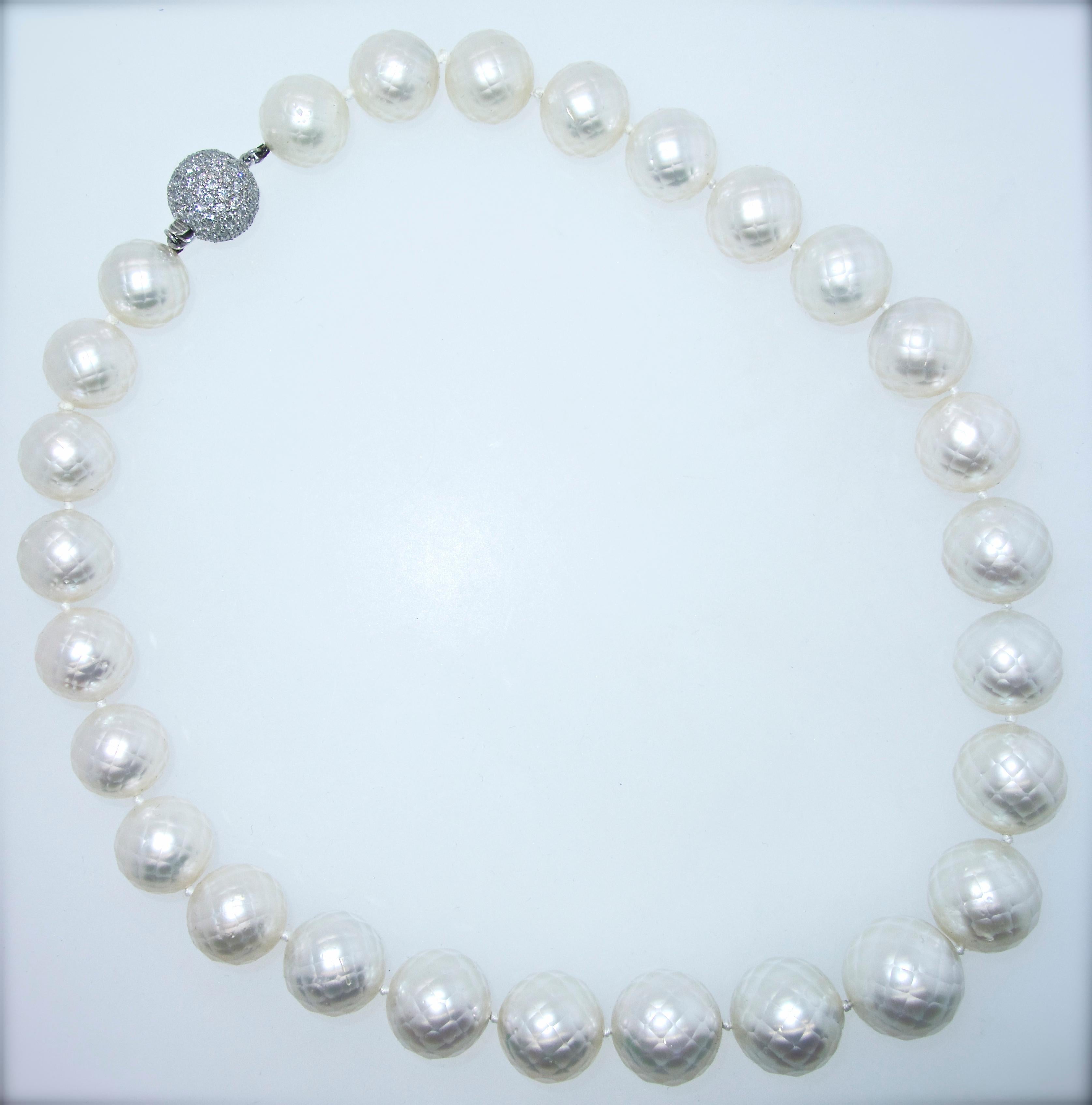 Highly unusual faceted natural South Sea pearls (accompanied by a certificate), 30 in count (two are included but not strung), these fine pearls display a deep nacre which makes each pearl luminous.  They range from 14 up to 17.5 mm. the slight